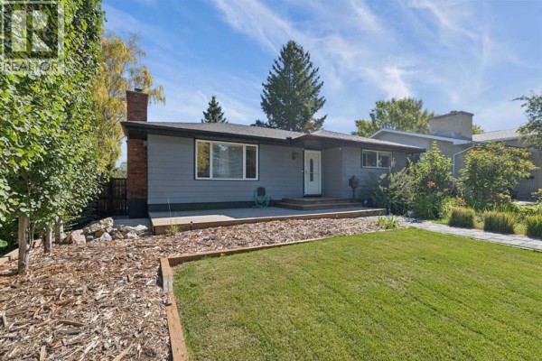 Living room - 7120 8 Street Nw, Calgary, AB T2K1G3 Photo 3