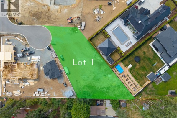 Overhead view of Lot 1, bordered by a swimming pool and landscaping of an adjacent luxury home. - 7128 Ocean Blue Pl, Lantzville