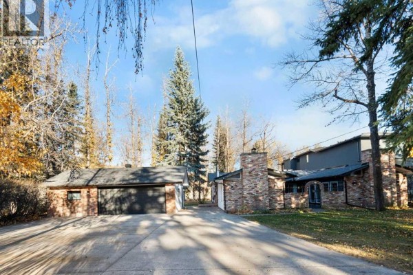 Family room - 7132 Bow Crescent Nw, Calgary, AB T3B2B9 Photo 4