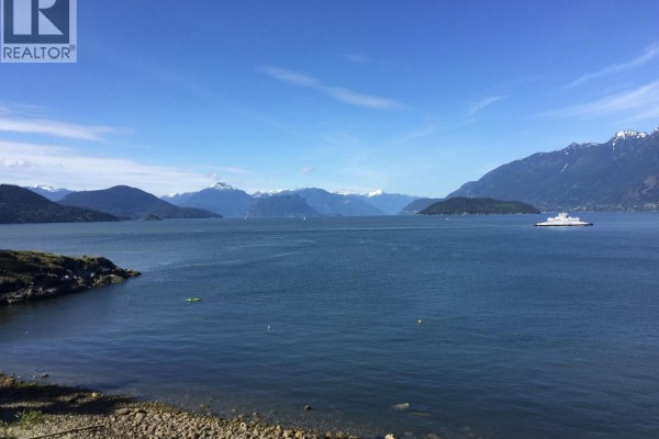 Evening view of the water with boats and forested hills - 7145 Cliff Road, West Vancouver