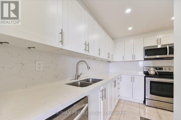 Kitchen - 716 - 80 Grandravine Drive, Toronto, ON M3J1B2 Photo 3