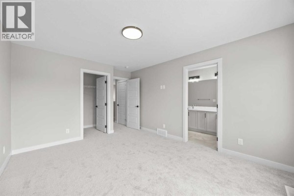 Living room - 72 Amblefield View Nw, Calgary, AB T3P2L6 Photo 2
