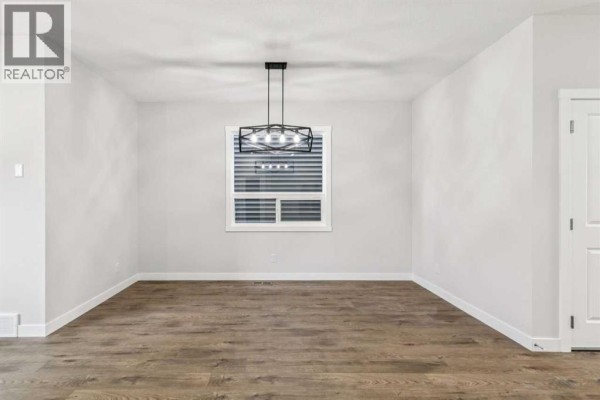 Dining room - 72 Creekview Common Sw, Calgary, AB T2X4Y1 Photo 3