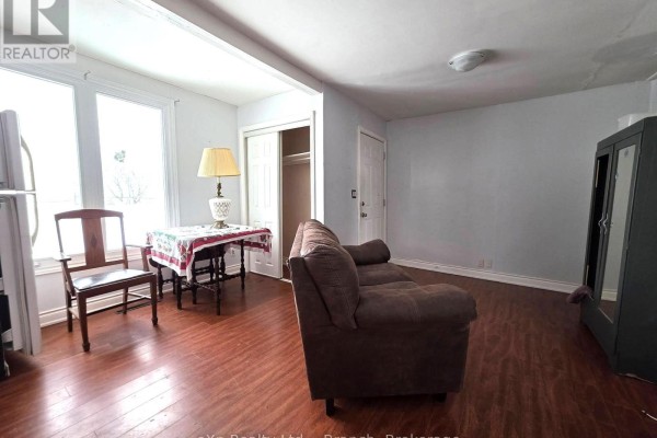 Bathroom featuring a shower, sink, and window for natural light - 72 Lebel Avenue, Kirkland Lake