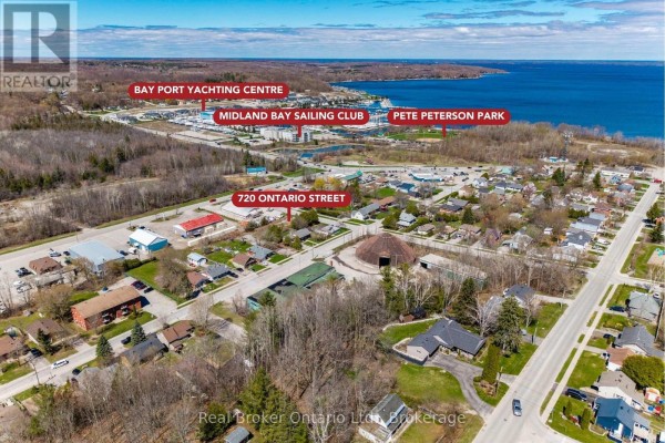 Aerial perspective of Midland with Georgian Bay, highlighting 720 Ontario Street's location. - 720 Ontario Street, Midland