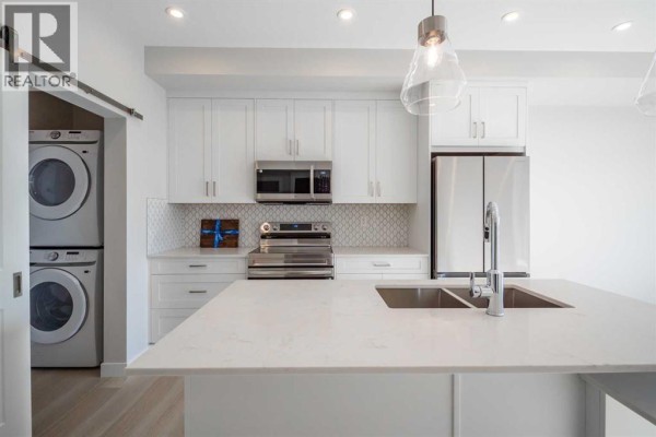 Laundry room - 7202, 1802 Mahogany Boulevard Se, Calgary, AB T3M4J2 Photo 3