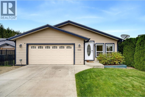 Front exterior of a beige single-story house with a garage, grass lawn, and entryway. - 7241 46 Street Ne, Salmon Arm