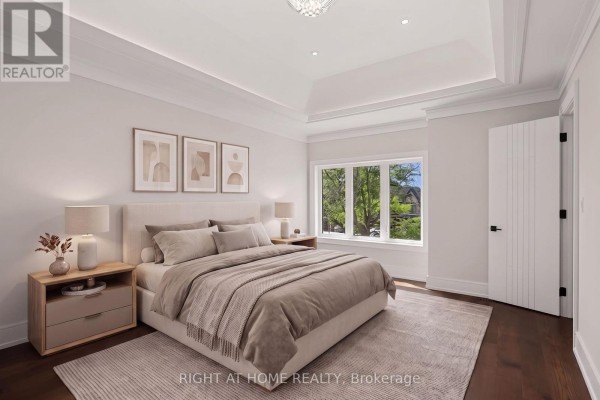 Bedroom with king-size bed, tray ceiling, and large window - 73 Harding Boulevard Richmond Hill