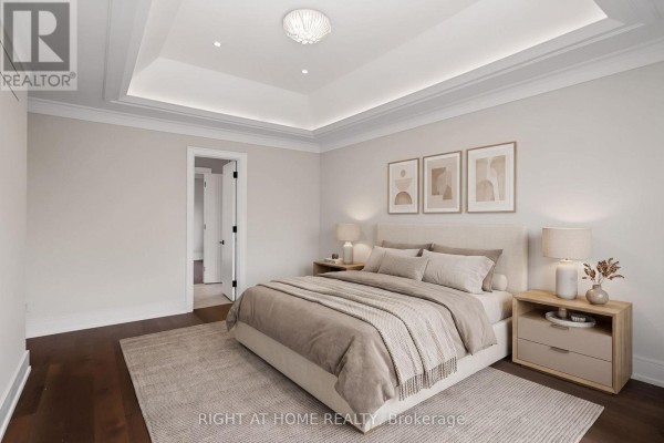 Primary bedroom with tray ceiling, recessed lighting, and artwork - 73 Harding Boulevard Richmond Hill