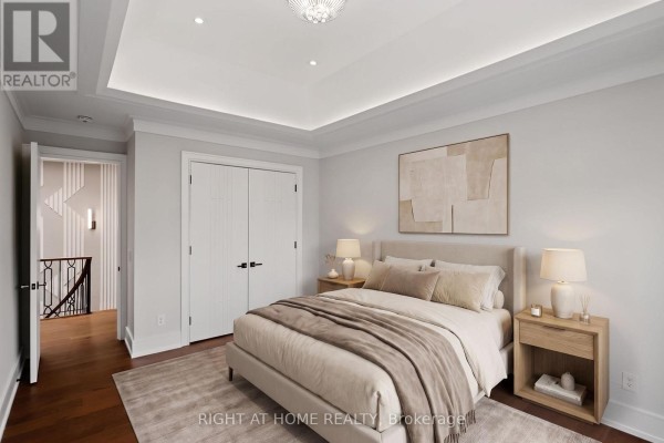 Bedroom with tray ceiling, nightstands, and art - 73 Harding Boulevard Richmond Hill
