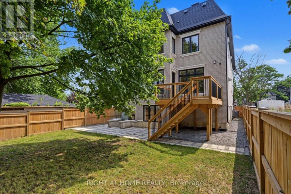 Backyard with deck, patio, fence, and grass - 73 Harding Boulevard Richmond Hill