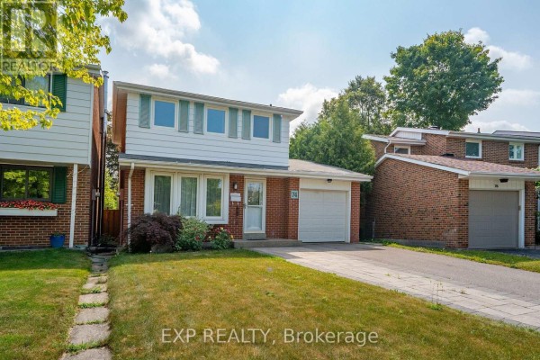 Front view of the house with a green lawn and paved driveway. - 74 Longford Crescent, Toronto