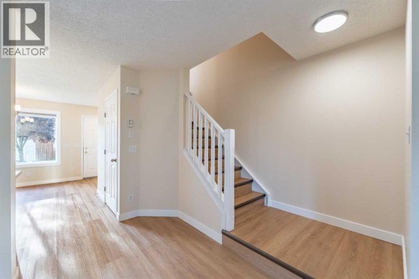 2pc Bathroom - 7415 26a Street Se, Calgary, AB T2C1E3 Photo 5