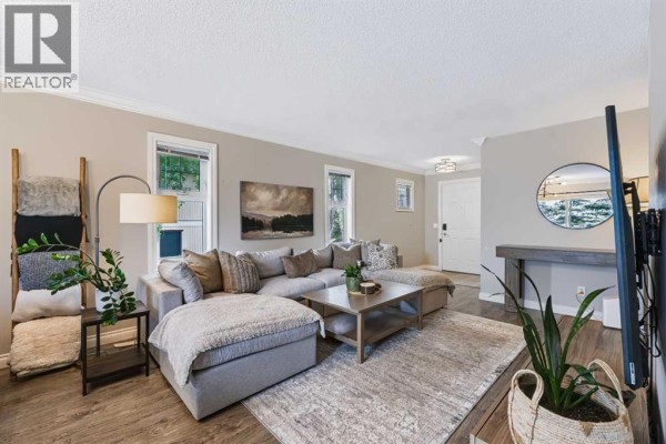 Living room - 75 Cedarwood Lane Sw, Calgary, AB T2W6J3 Photo 4