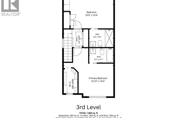 Floor plan of the third level showing a primary bedroom with walk-in closet, a second bedroom, and two bathrooms. - 750 Lawrence Street Unit# 38, Cambridge