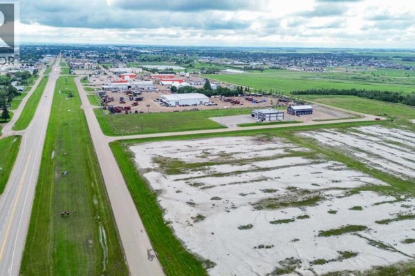 Close-up of the snow-covered land, showing the road intersections and surrounding landscape. - 7501 50 Avenue, Stettler
