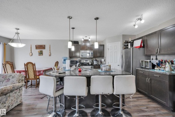 Family room - #31 7503 Getty Gate Ga Nw, Edmonton, AB T5T4S8 Photo 4