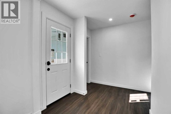 Living room - 7520 7 Street Sw, Calgary, AB T2V1G2 Photo 2