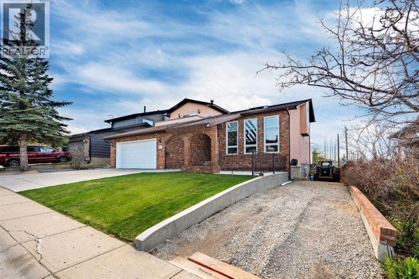 Family room - 76 Beaconsfield Way Nw, Calgary, AB T3K1X1 Photo 3