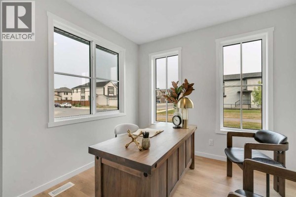 Living room - 76 Heirloom Drive Se, Calgary, AB T3M2M6 Photo 5