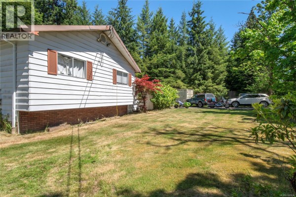 Family room - 7602 Island Hwy N, Black Creek, BC V9J1G3 Photo 4