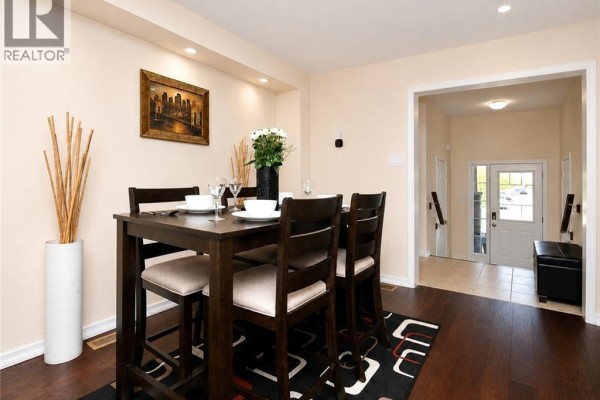 Interior entryway with two white doors and a glass-paned front door with a view outside. - 78 Glenvista Drive Unit# Upper, Kitchener