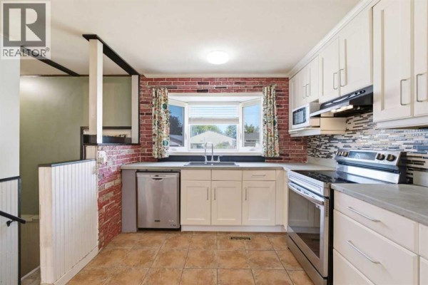 Kitchen - 7807 Olympia Bay Se, Calgary, AB T2C1N7 Photo 5