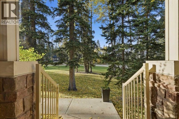 Family room - 79 Hawk's Landing Drive, Priddis Greens, AB T0L1W3 Photo 4