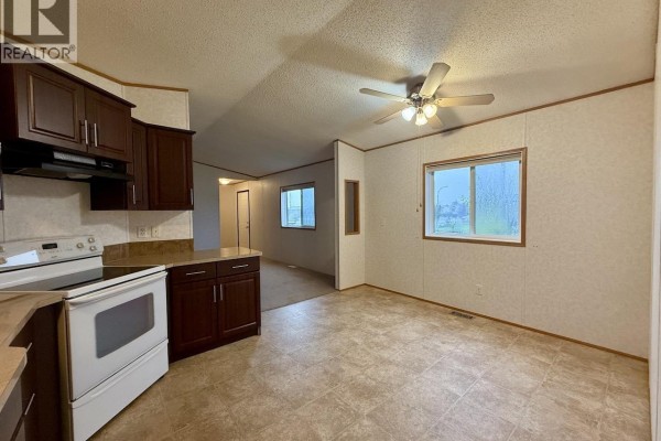 Living room - 7926 85a Avenue, Fort St  John, BC V1J0H7 Photo 2