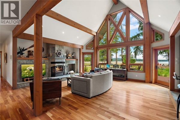 Living room - 7928 White Duck Rd, Fanny Bay, BC V0R1W0 Photo 4