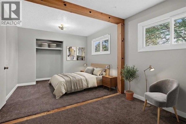 Primary Bedroom - 7935 Huntwick Hill Ne, Calgary, AB T2K4G9 Photo 5