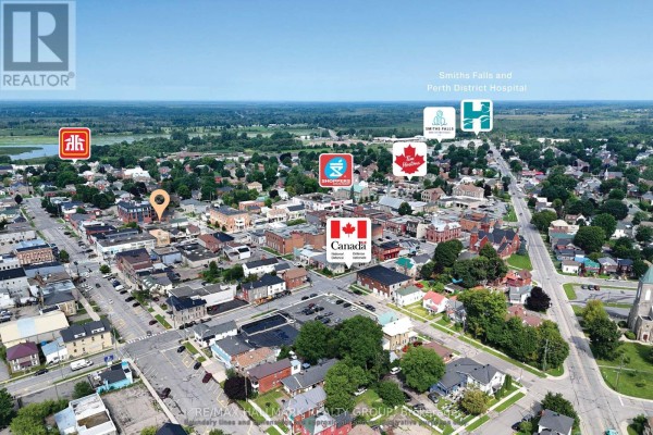 Aerial view of Smiths Falls downtown core highlighting 8 Beckwith Street N's proximity to the hospital and Canada Post. - 8 Beckwith Street N, Smiths Falls