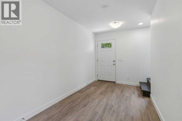 Laundry room - 801, 24 Rivercrest Drive, Cochrane, AB T4C2C8 Photo 4