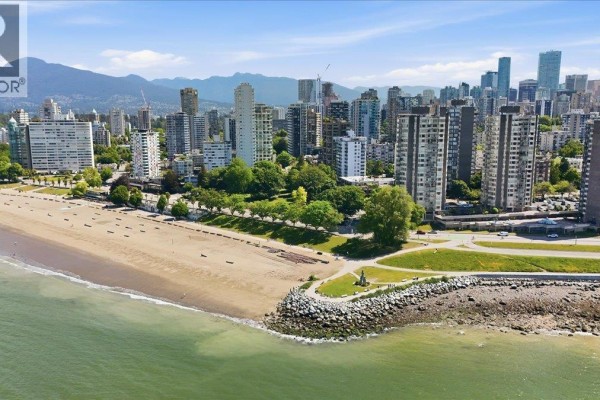 Aerial view of Vancouver city skyline, Stanley Park, and English Bay beach. - 802 1251 Cardero Street, Vancouver