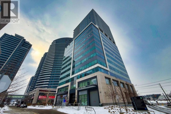 Wide angle exterior shot of 7191 Yonge Street commercial building on a cloudy day - 803 - 7191 Yonge Street, Markham