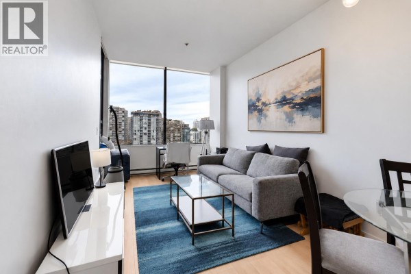 Living room with grey sofa, dining table, and expansive city view. - 807 1010 Howe Street, Vancouver