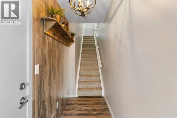 Living room - 808, 501 River Heights Drive, Cochrane, AB T4C2L3 Photo 5