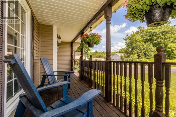 View from the front porch with two blue chairs looking out towards the street. - 81 Terra Nova Drive, Greenwood