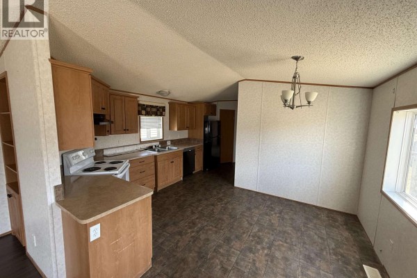 Living room - 8101 85a Avenue, Fort St  John, BC V1J0H7 Photo 2