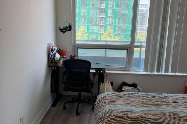 Bedroom with desk, office chair, and bed - 811 - 2 Anndale Drive Toronto