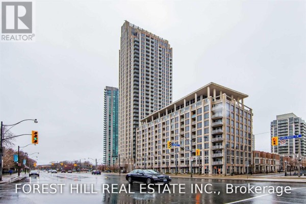 Exterior of a residential building complex with a tall tower and a lower section with balconies. - 812 - 628 Fleet Street S, Toronto
