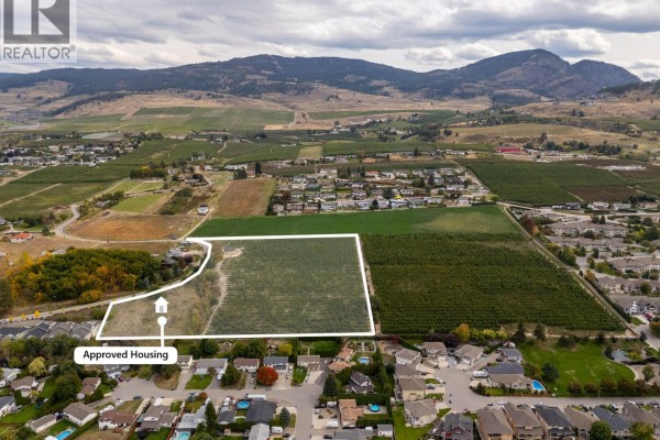 Aerial view showing property boundaries with outline of approved housing area. - 815 Webster Road, Kelowna