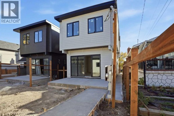 Family room - 816 21 Avenue Nw, Calgary, AB T2M1K4 Photo 3