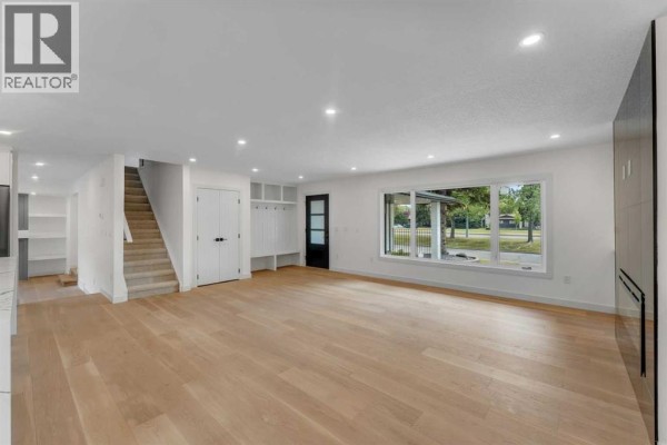 Living room - 816 Lake Ontario Drive Se, Calgary, AB T2J3J9 Photo 5