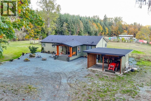 Living room/Dining room - 8258 Trans Canada Hwy, Westholme, BC V0R1K0 Photo 5