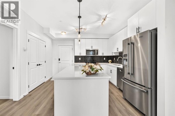 Kitchen - 8317, 151 Legacy Main Street Se, Calgary, AB T2X4A4 Photo 3