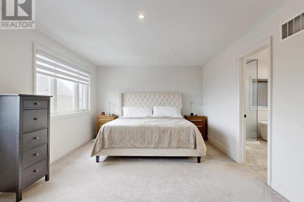 Fireplace, staircase, and laundry room - 833 Langford Boulevard Bradford West Gwillimbury
