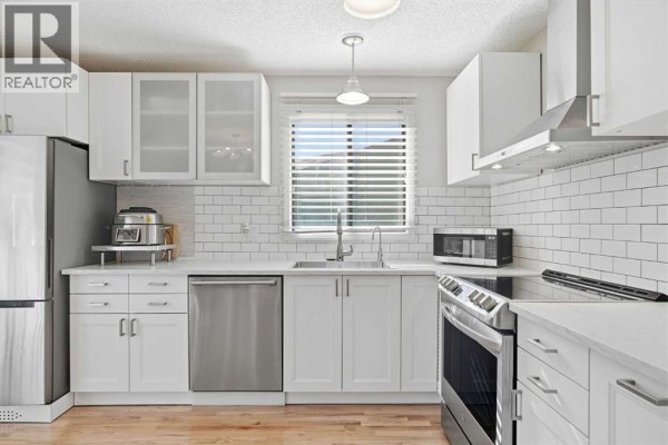 Living room - 84 Glendale Way, Cochrane, AB T4C1H9 Photo 5