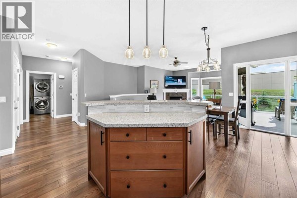 Dining room - 84 River Heights View, Cochrane, AB T4C0E6 Photo 5