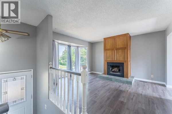 Living room - 84 Templehill Drive Ne, Calgary, AB T1Y4C3 Photo 5